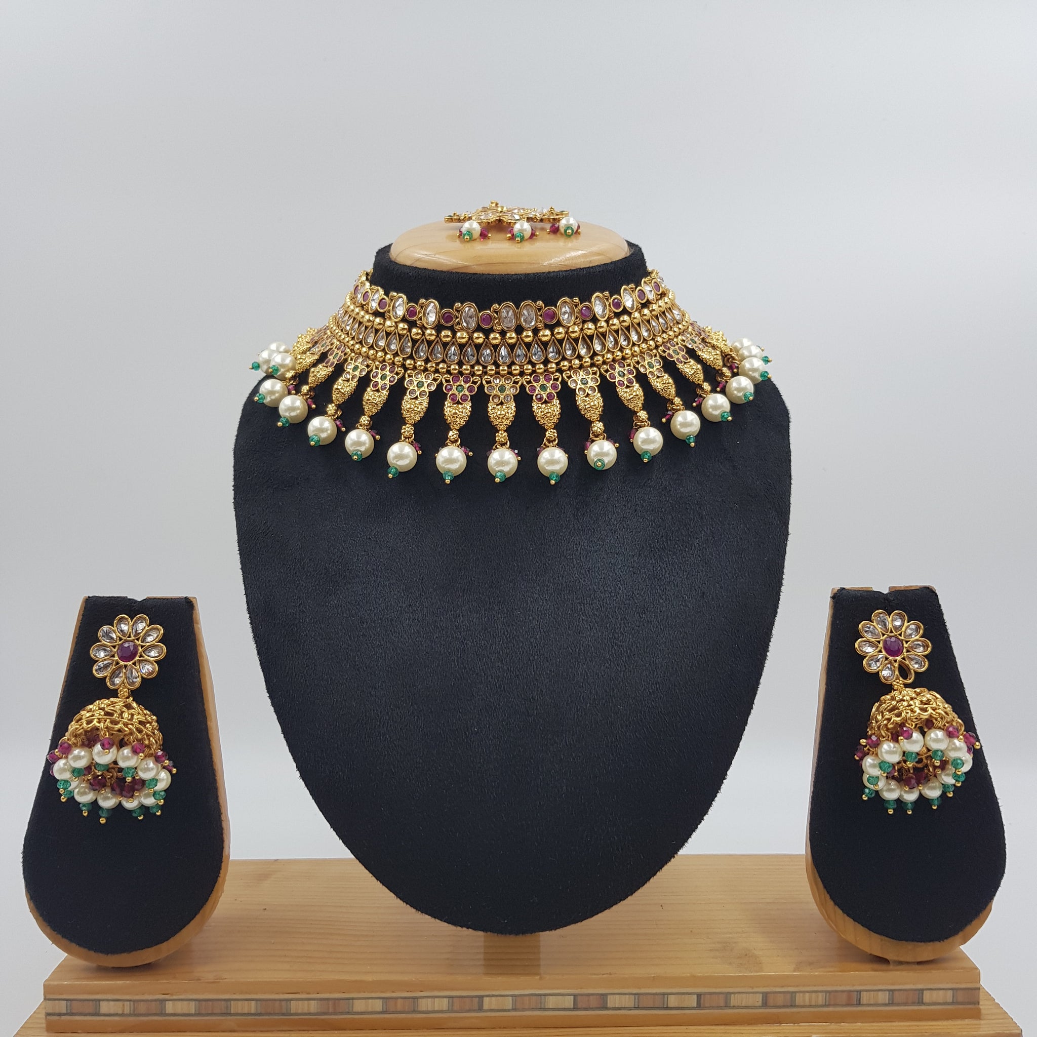 Polki Choker Set With Ruby Green Emerald Stones