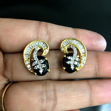 Tops Of Carry Shape Elegant Pendant Set With Diamond, Crystal Work And Black Stone